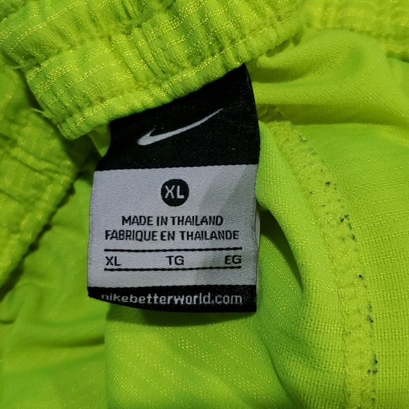 2 pairs of yellow Nike basketball shorts - Picture 2 of 3